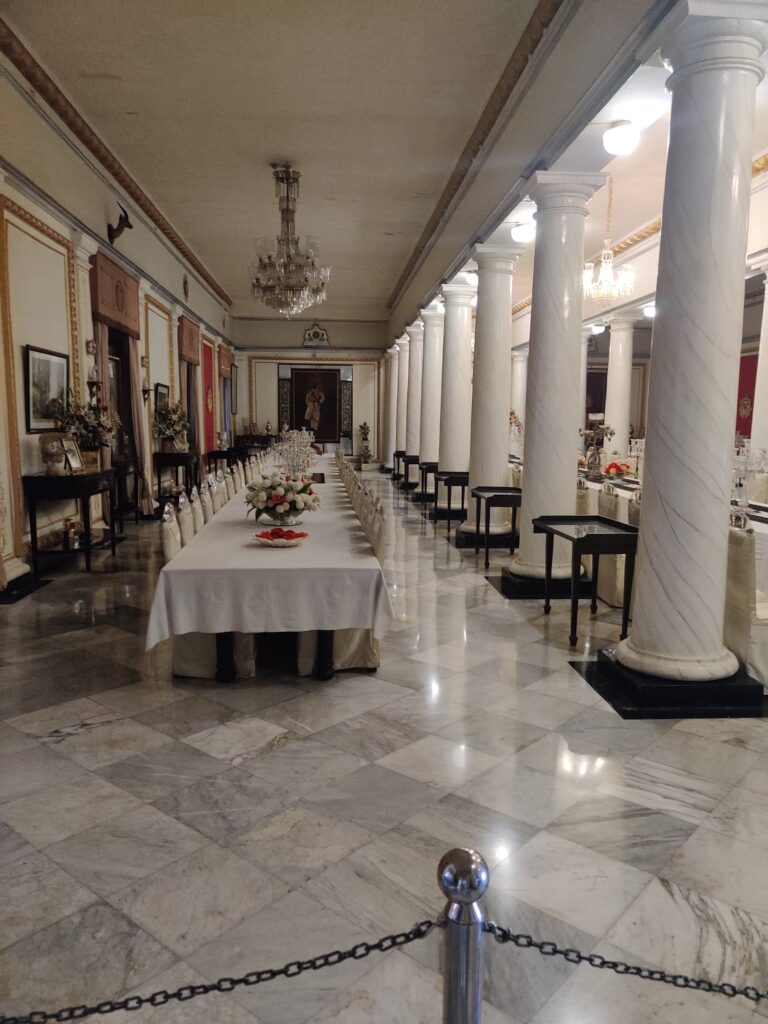 elongated dining table, Jai Vilas Palace